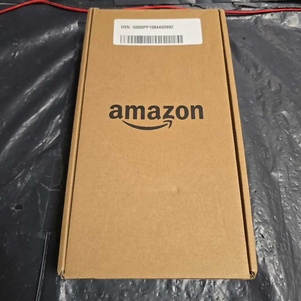 AMAZON KINDLE E-READER (BLACK) IN ORIGINAL BOX; SCREEN SHOWS LOW BATTERY ICON