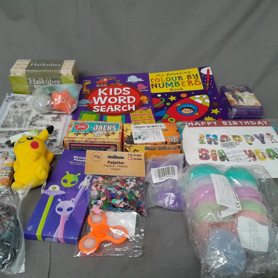 LOT OF ASSORTED TOYS AND GAMES TO INCLUDE POKEMON, COLOURING BOOKS AND JACKS 