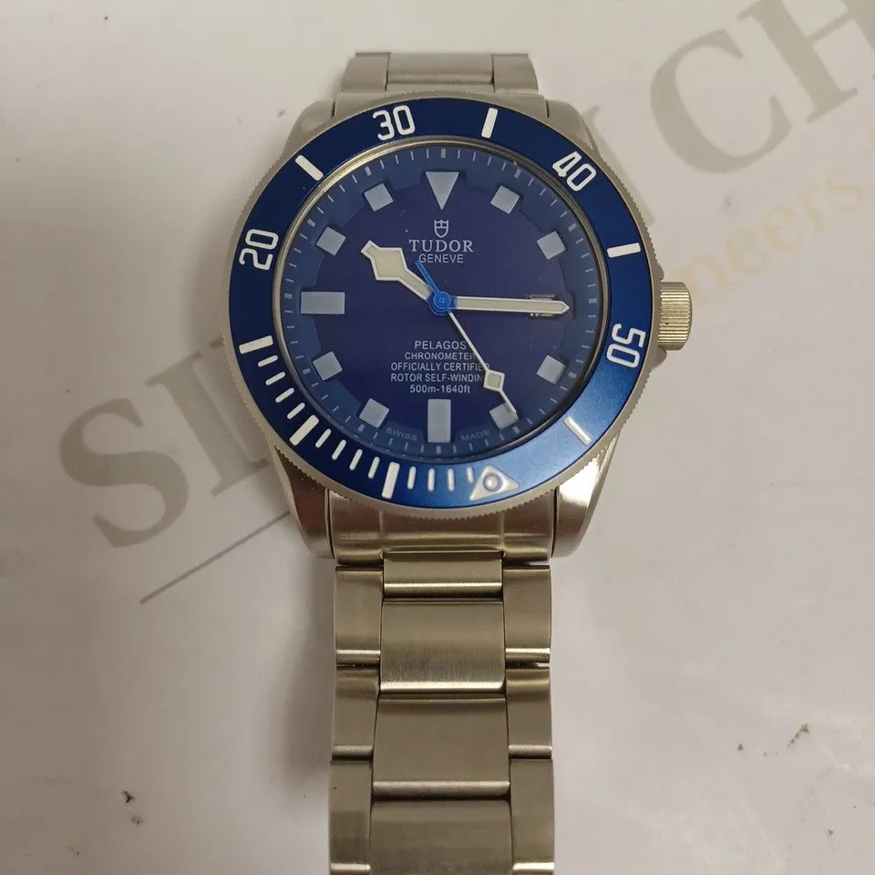 TUDOR GENEVE SILVER WATCH WITH BLUE FACE AND BRACELET STRAP