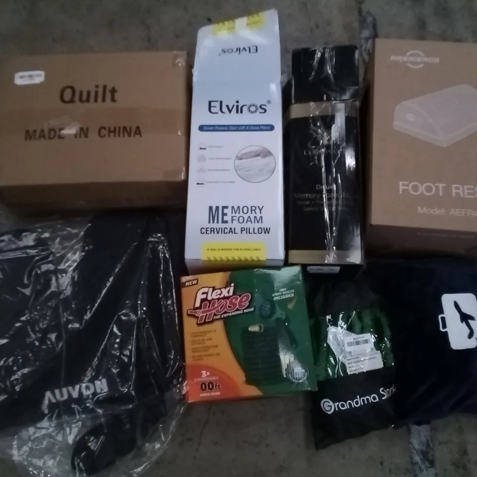 PALLET OF ASSORTED ITEMS INCLUDING KING-SIZE QUILT, ELVIROS MEMORY FOAM CERVICAL PILLOW, FLEXI HOSE, TRAVEL PILLOW, AMERIERGO FOOT REST, GRANDMA SHARK HOSE