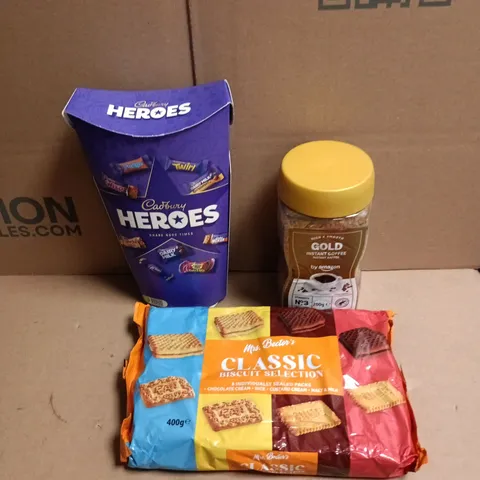 APPROXIMATELY 12 ASSORTED FOOD AND DRINKS ITEMS TO INCLUDE - GOLD INSTANT COFFEE BY AMAZON, HEROES CHOCOLATE BOX, CLASSIC BISCUIT SELECTION ETC 