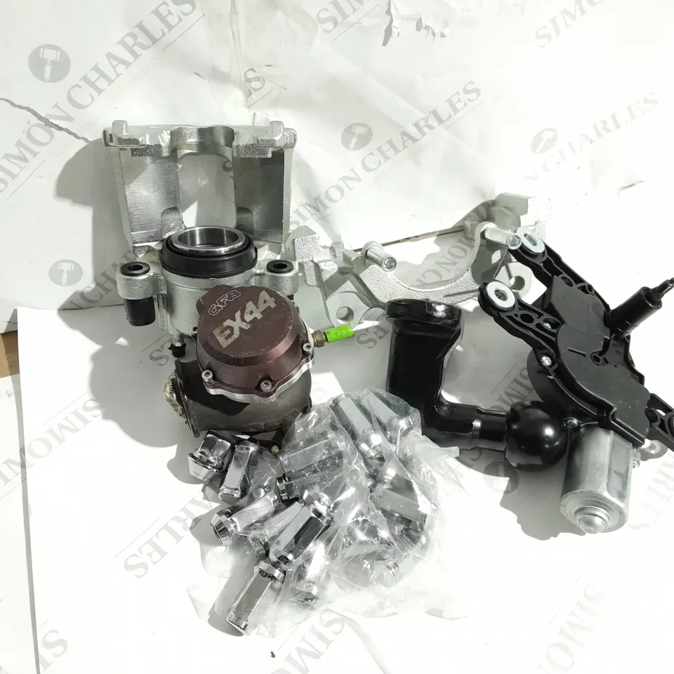 APPROXIMATELY 20 ASSORTED ITEMS TO INCLUDE BRAKE CALIPER, WIPER MOTOR, TOW BALL, WASTEGATE, WHEEL NUTS, SPARK PLUGS ETC. 