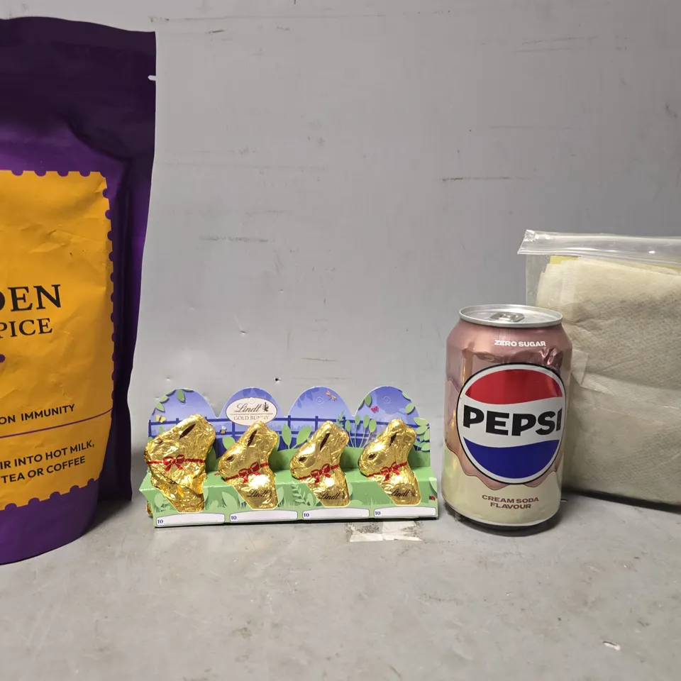 APPROXIMATELY 10 ASSORTED FOOD & DRINK ITEMS TO INCLUDE - PEPSI CREAM SODA , LINDT GOLD BUNNY , GOLDEN CHAI SPICE ETC