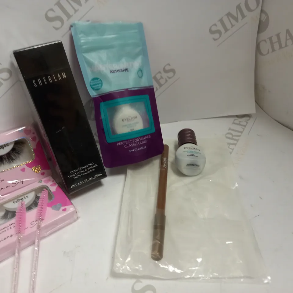 LOT OF APPROX 7 TO INCLUDE BODY COLLECTION BRUSH , SHEGLAM FOUNDATION , LASHES , ETC