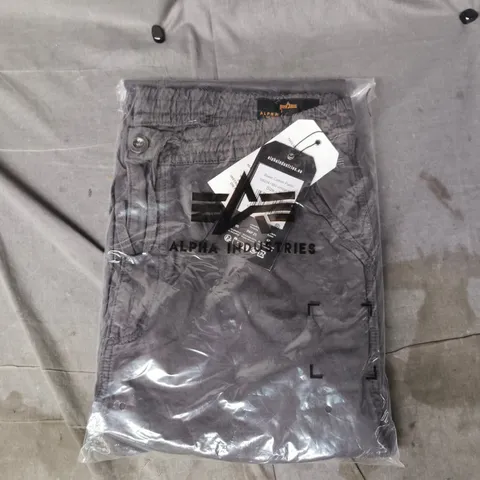BAGGED ALPHA INDUSTRIES BASIC COTTON PANTS IN VINTAGE GREY SIZE 33