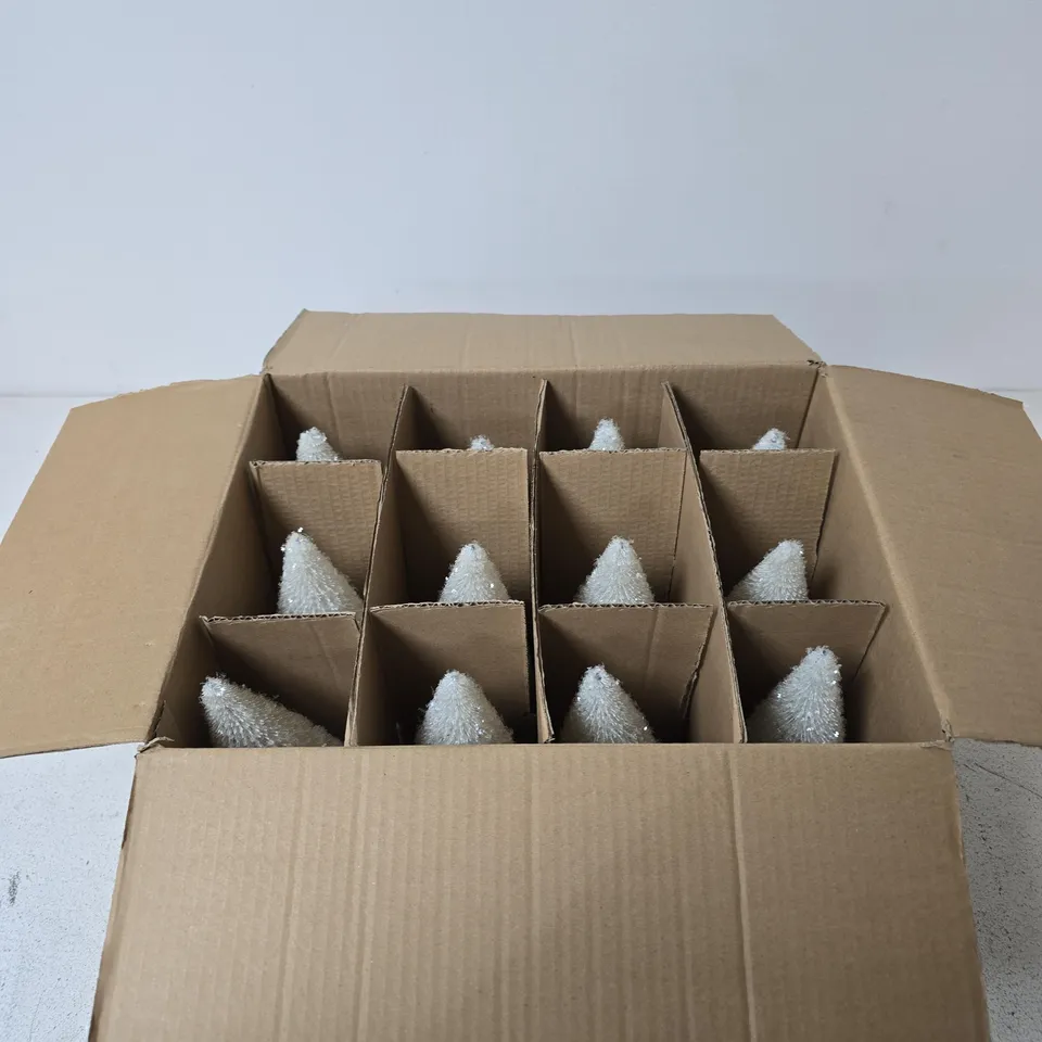 BOX OF APPROXIMATELY 12 GISELA GRAHAM LONDON WHITE BOTTLEBRUSH CHRISTMAS TREE, ON A WOODEN BASE