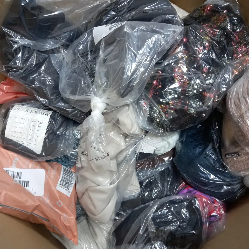 BOX OF ASSORTED CLOTHING ITEMS TOO INCLUDE TOPS , JUMPERS, AND PANTS ETC. 