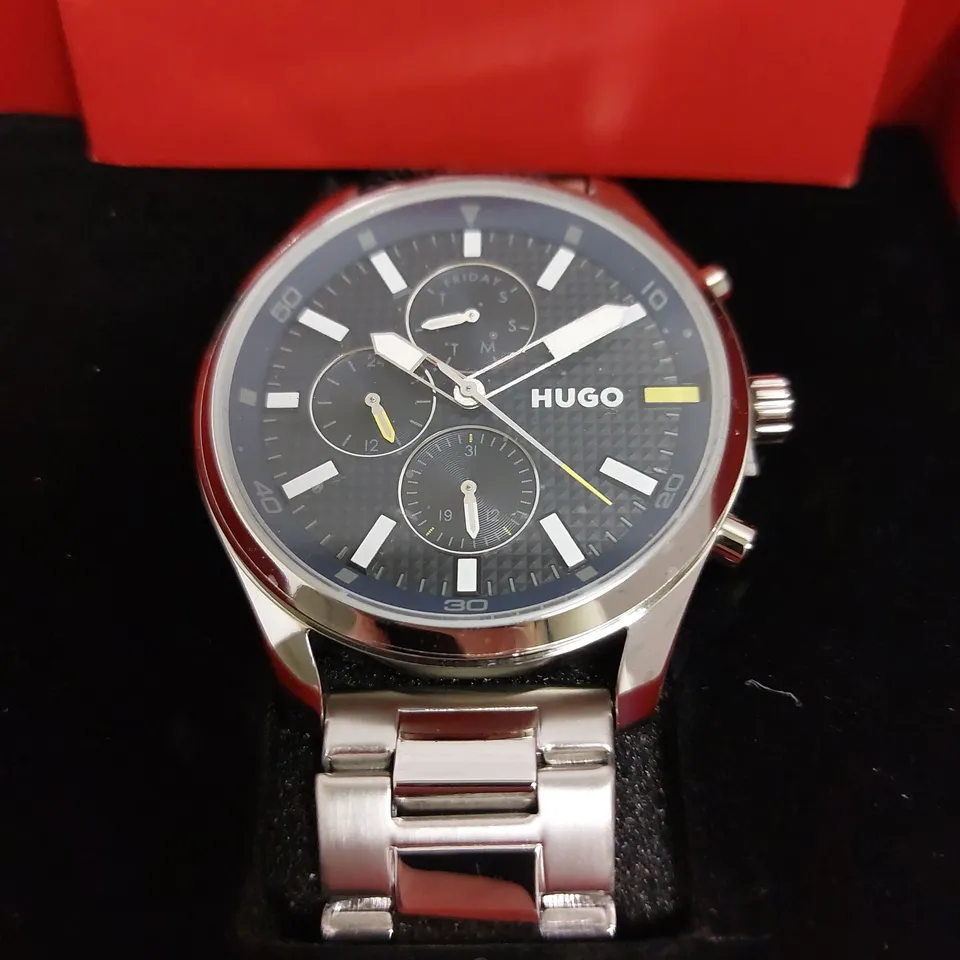BOXED HUGO BOSS HUGO SKELETON BLUE DIAL WRIST WATCH