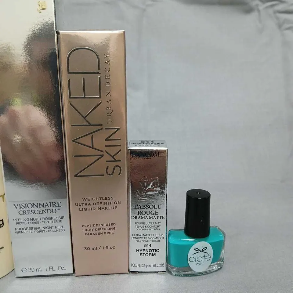 APPROXIMATELY NINE ASSORTED COSMETICS PRODUCTS TO INCLUDE; 