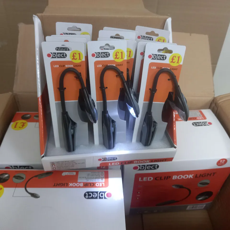 box of aprox 40 OBJECT LED CLIP BOOK LIGHT 