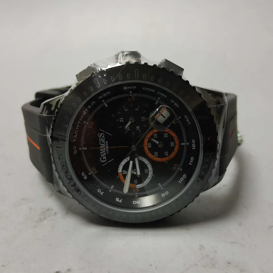 BOXED GAMAGES LONDON NAVIGATOR WATCH IN BLACK/ORANGE