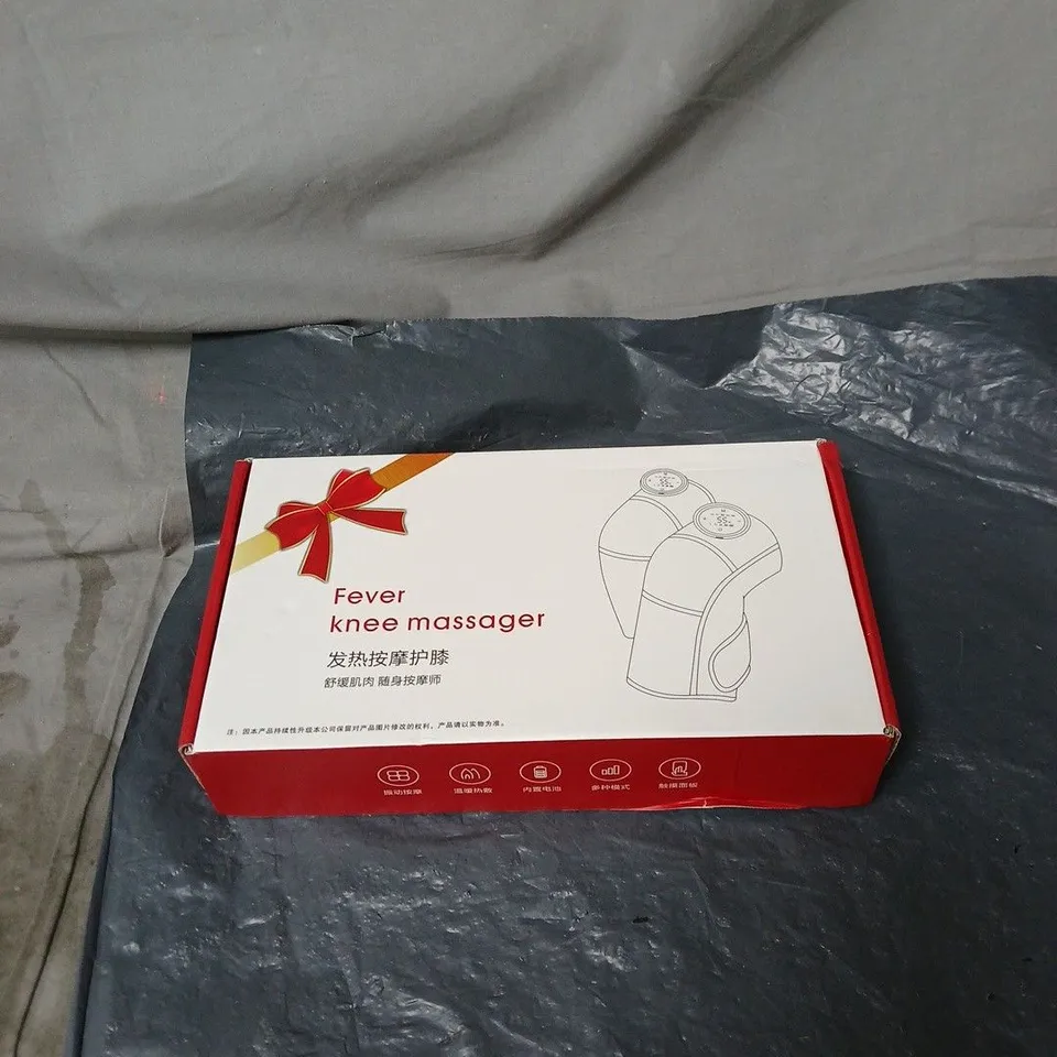FEVER KNEE MASSAGER WITH MANUAL AND CABLE. BOXED