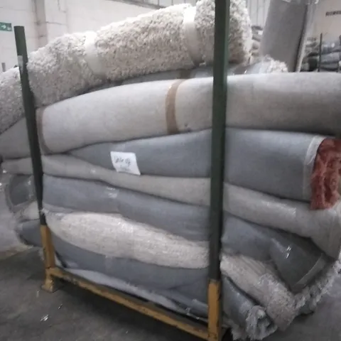 STILLAGE OF APPROXIMATELY 22 DESIGNER RUGS