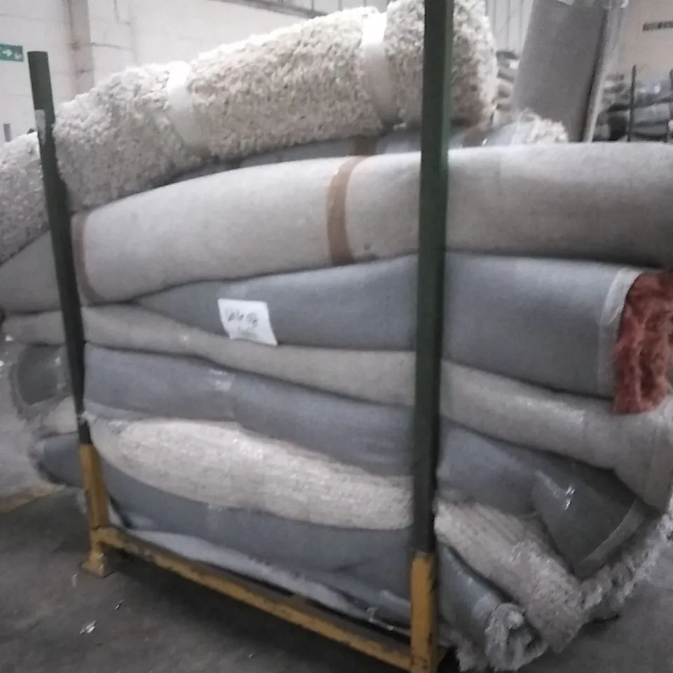 STILLAGE OF APPROXIMATELY 22 DESIGNER RUGS