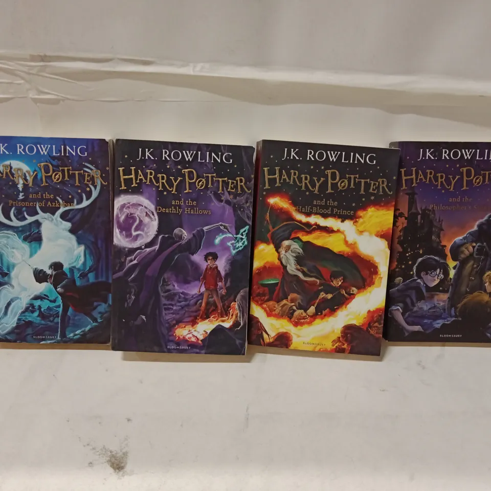 HARRY POTTER BOOKS – 4 PAPERBACK BOOK SET BY J.K. ROWLING