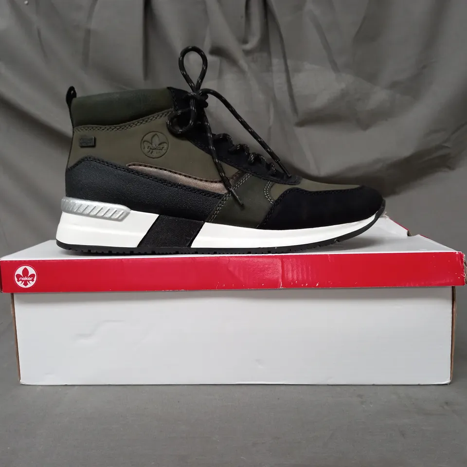 BOXED PAIR OF RIEKER HI TOP TRAINER BOOTS IN KHAKI SIZE 6
