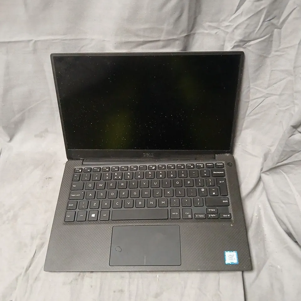 DELL LAPTOP – BLACK. MODEL UNSPECIFIED.