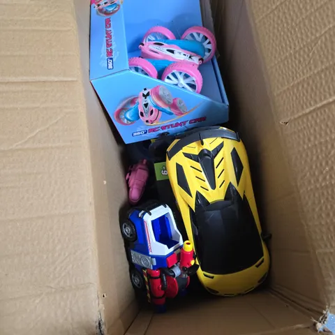 BOX OF APPROXIMATELY 7 ASSORTED TOYS INCLUDING RC STUNT CAR AND TOY FIRE TRUCK 