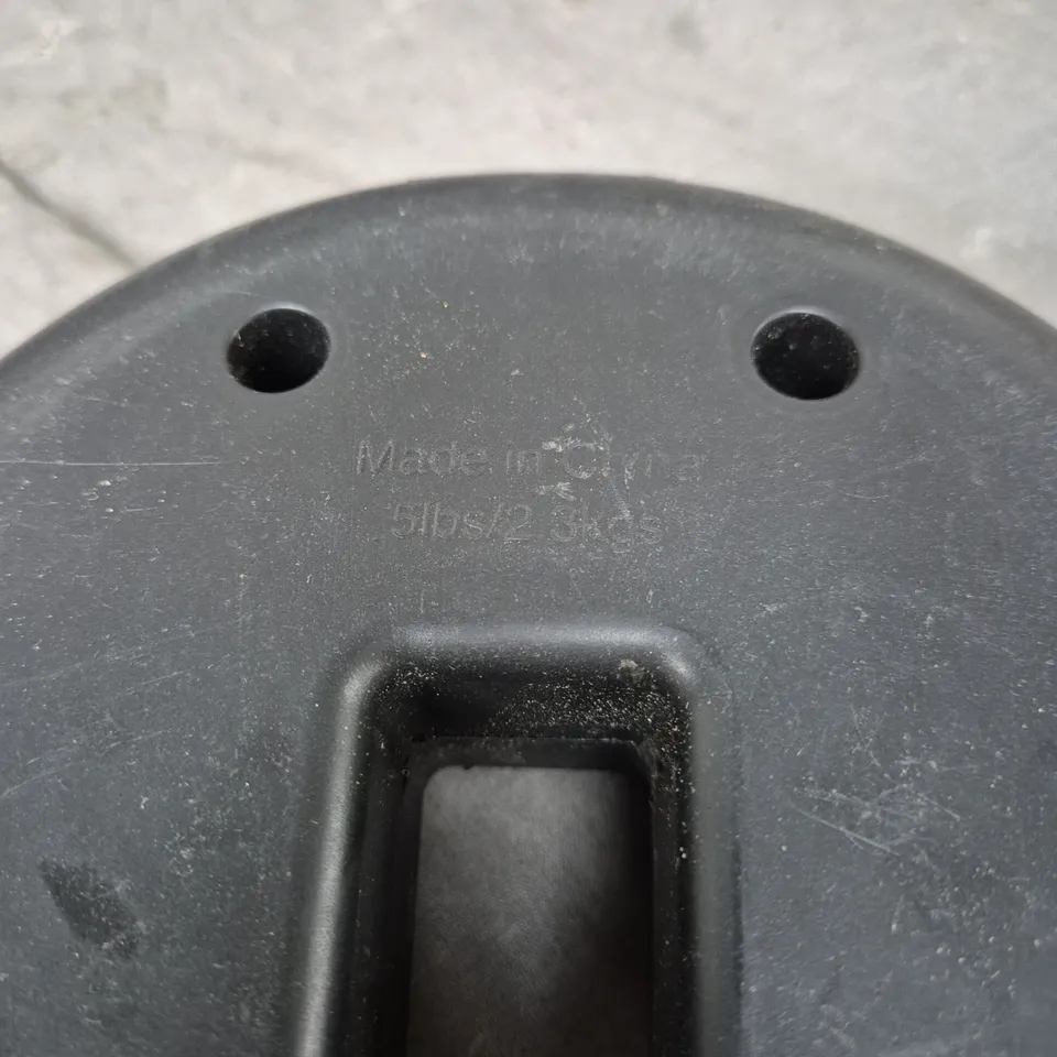 SET OF 4 ROUND BLACK OUTDOOR FURNITURE WEIGHTS - 2.3KGS EACH, COLLECTION ONLY