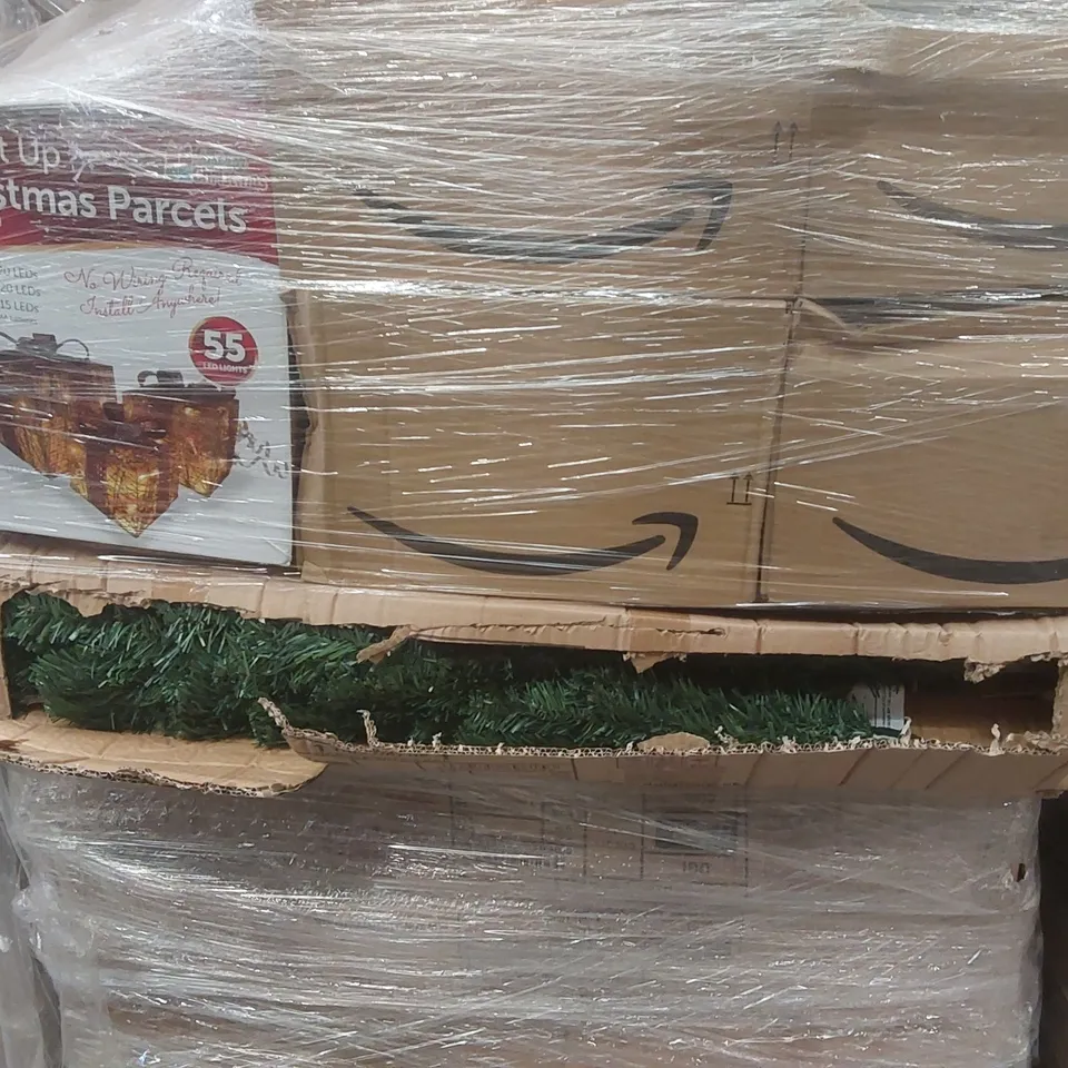 PALLET CONTAINING A VERY LARGE QUANTITY OF ASSORTED ITEMS INCLUDING: LIGHT UP CHRISTMAS PARCELS, ARTIFICIAL CHRISTMAS TREES, LIGHT UP PENGUIN, LED WREATHS ECT