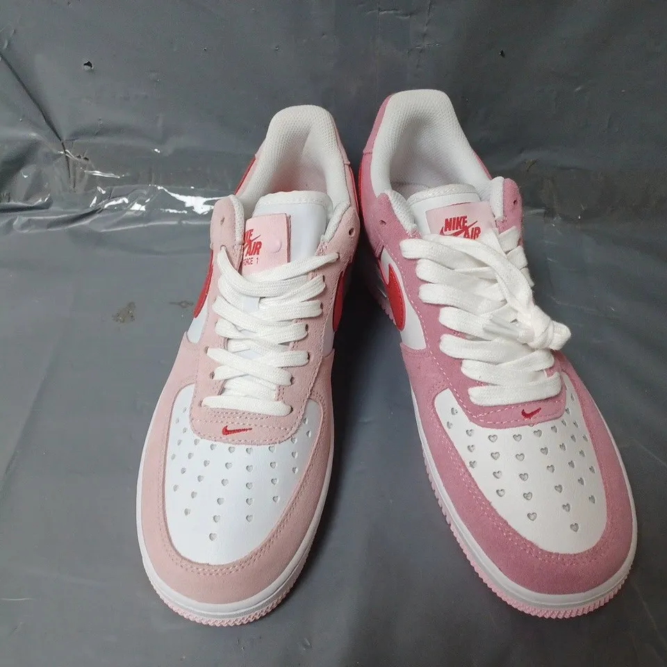PAIR OF NIKE AIR FORCE 1 HEART TRAINERS IN PINK/WHITE
