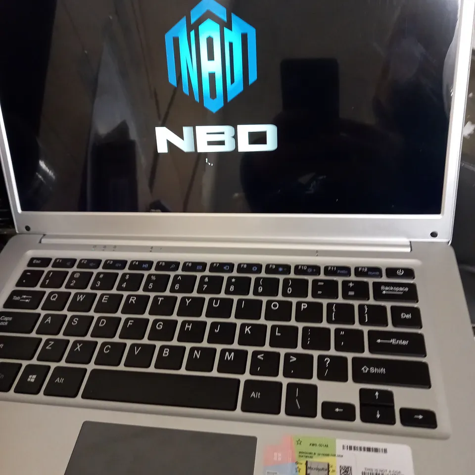 NBD SILVER LAPTOP APPROX. 13.7" SCREEN, INCLUDES MOUSE, EARPHONES AND UNIQUE CASE 