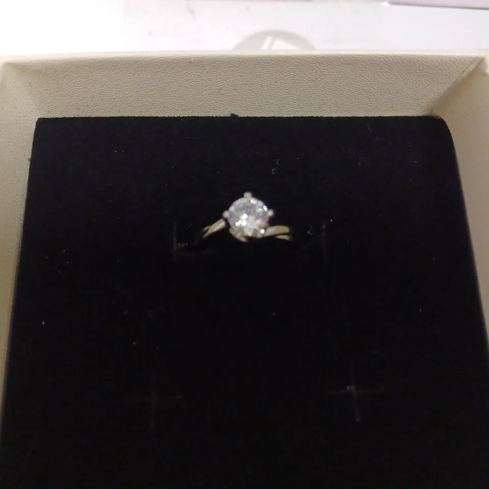 SILVER LOOP RING WITH PRINCESS CUT STONE