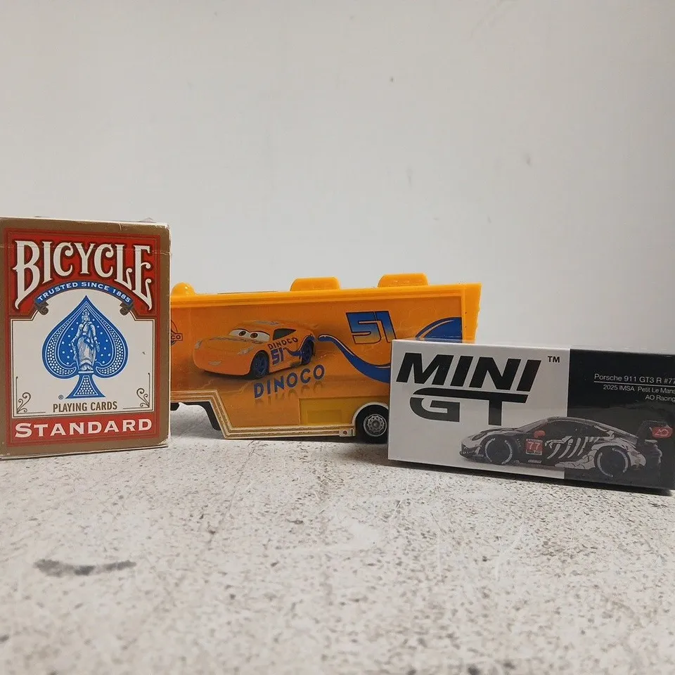APPROXIMATELY 12 ASSORTED TOYS AND GAMES TO INCLUDE PLAYING CARDS, ETC