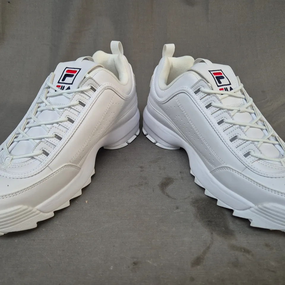 BOXED PAIR OF FILA DISRUPTOR LOW SHOES IN WHITE UK SIZE 11