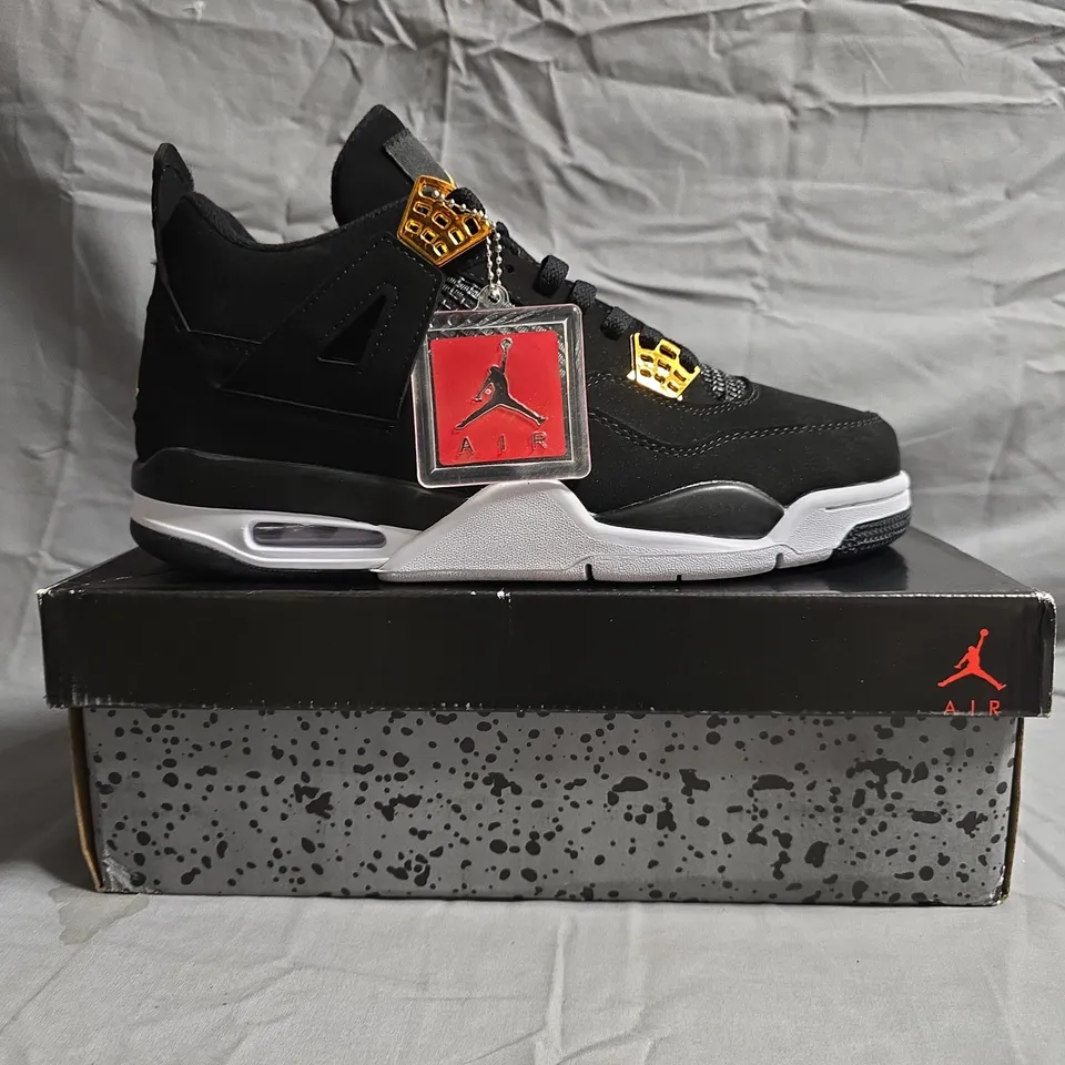 BOXED PAIR OF NIKE AIR JORDAN 4 RETRO SHOES IN BLACK SIZE UK 9