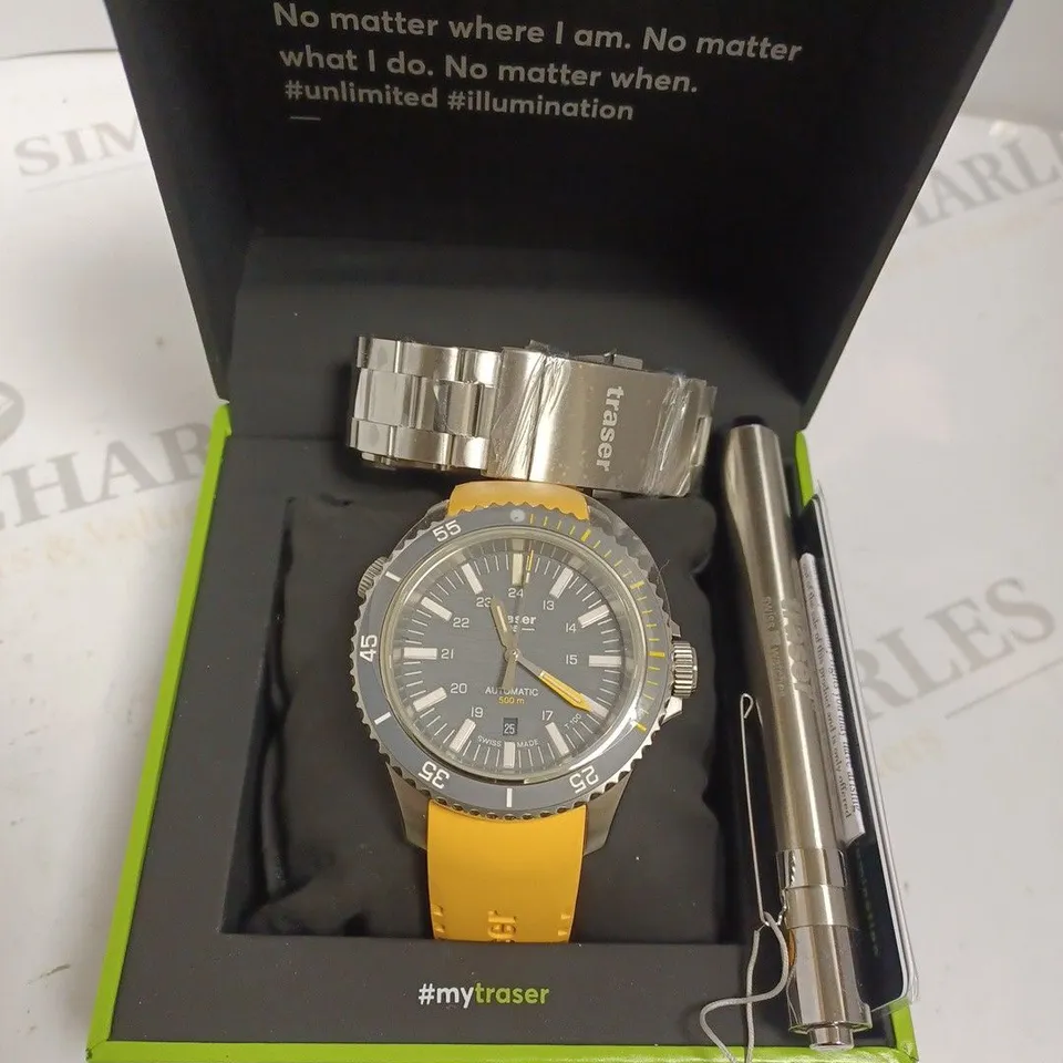 BOXED TRASER WATCH WITH YELLOW SILICONE STRAP AND CHANGEABLE SILVER LINK STRAP, AND TRASER MINI TORCH 
