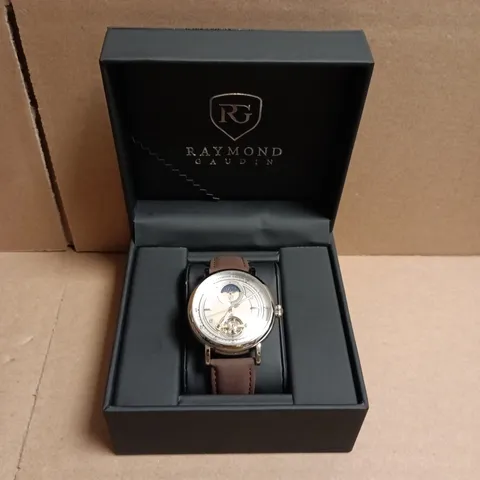 BOXED RAYMOND GAUDIN WRISTWATCH – STAINLESS STEEL CASE, BROWN LEATHER STRAP, EXHIBITION CASE BACK