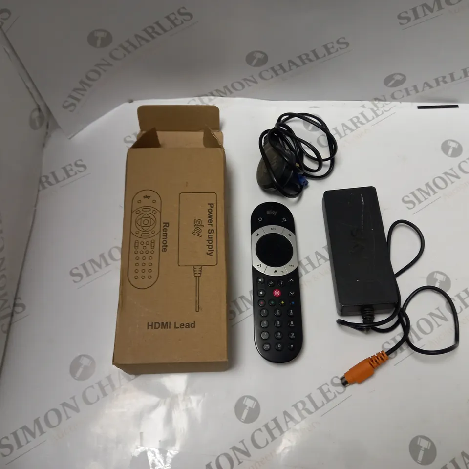 BOXED SKY REMOTE CONTROL AND POWER SUPPLLY