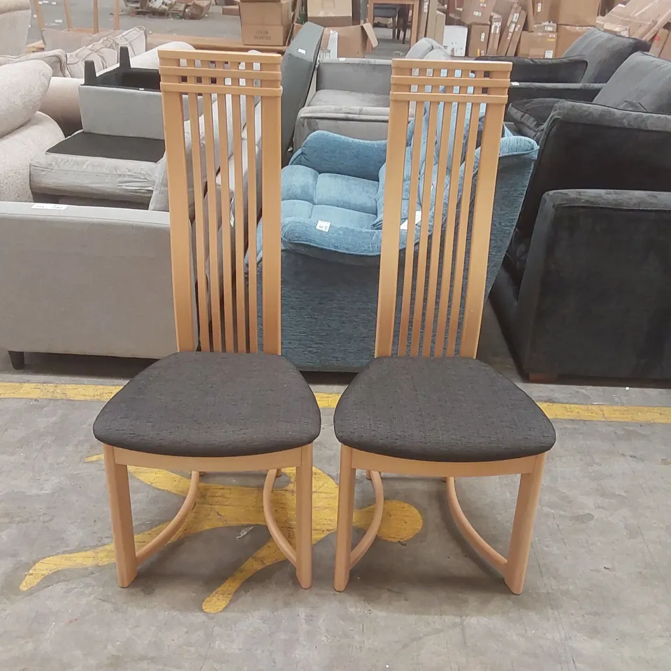 PAIR OF DESIGNER WOODEN HIGH BACK DINING CHAIRS WITH UPHOLSTERED PADDED SEATS