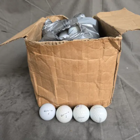 APPROXIMATELY 30 GOLF BALLS IN WHITE