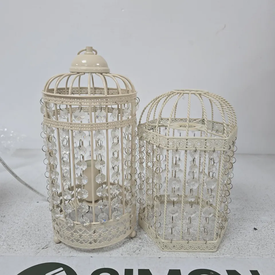 TWO CREAM-COLOURED DECORATIVE LANTERNS WITH CRYSTAL BEADS