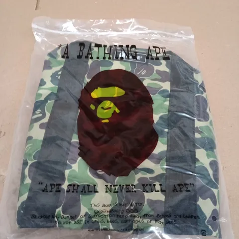 A BATHING APE (BAPE) CAMOUFLAGE DUFFEL BAG
