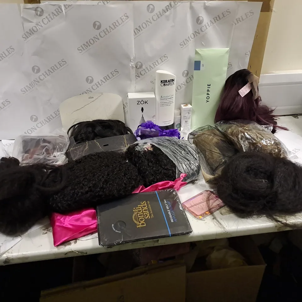 BOX OF APPROXIMATLY 20 ITEMS TO INCLUDE WIGS, HAIR EXTENSIONS, EYELASH BRUSH ETC