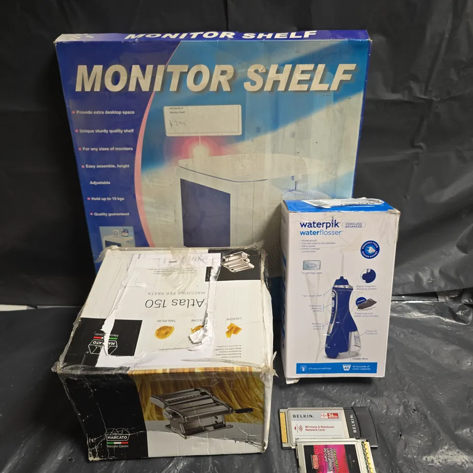 BOX OF APPROXIMATELY 5 ASSORTED ITEMS TO INCLUDE - WATERPICK - MONITOR SHELF - COTTON CANDY MACHINE - ETC