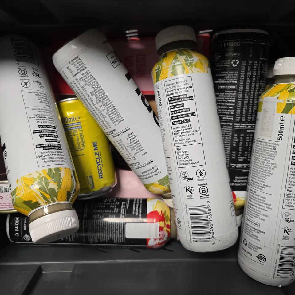 APPROXIMATELY 12 ASSORTED FOOD & DRINK ITEMS TO INCLUDE - HUEL BANANA , CARTWRIGHT LUXURY BISCUIT SELECTION , FANTA LEMON ETC