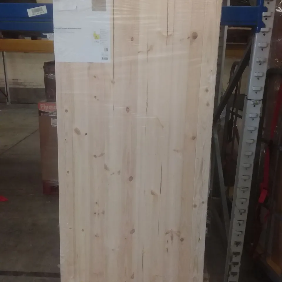 PINE FRAMED, LEDGED AND BRACED FRONT DOOR 1981X834X44mm