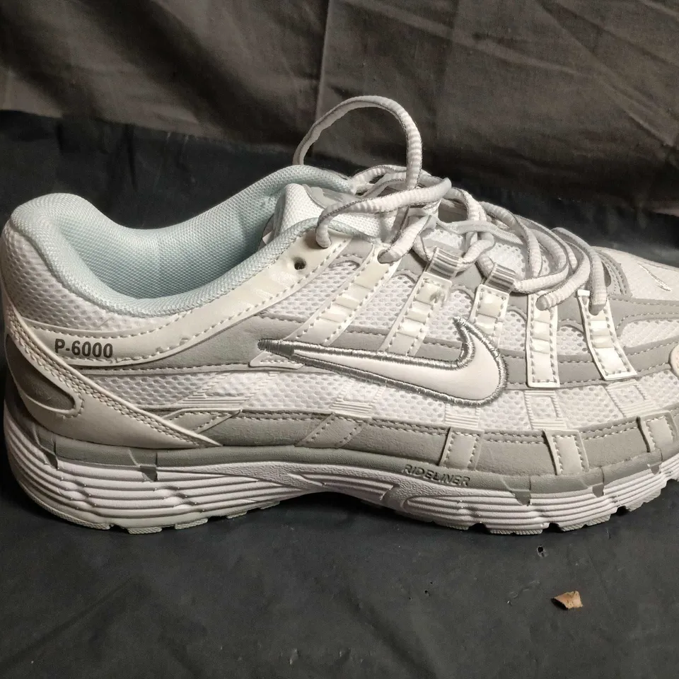 PAIR OF NIKE P6000 TRAINERS - UK SIZE 7