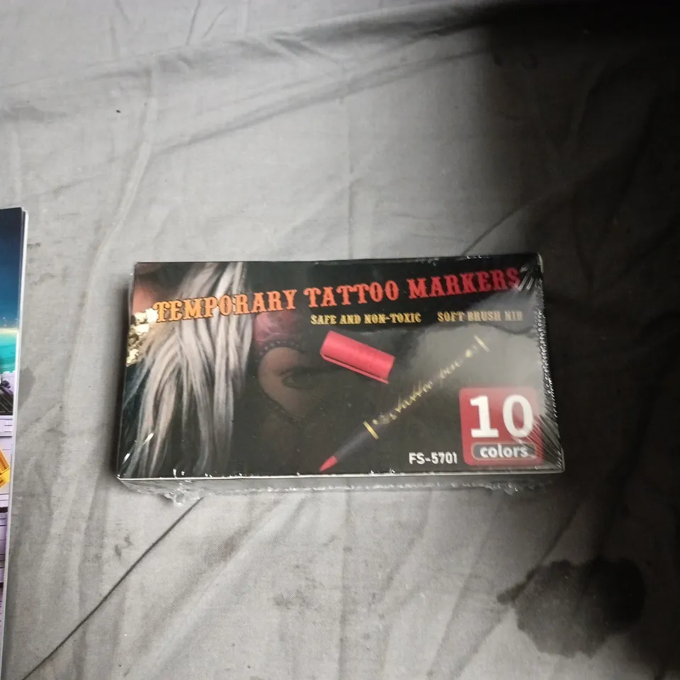 APPROXIMATELY 11 ASSORTED TOYS INCLUDING TEMPORARY TATTOO MARKERS , MINI TRANSFORMER FIGURE AND LEGO HARRY POTTER STICKER BOOK