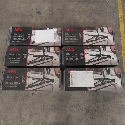 LOT CONTAINING 6 AEG QX9 HOME & CAR KITS