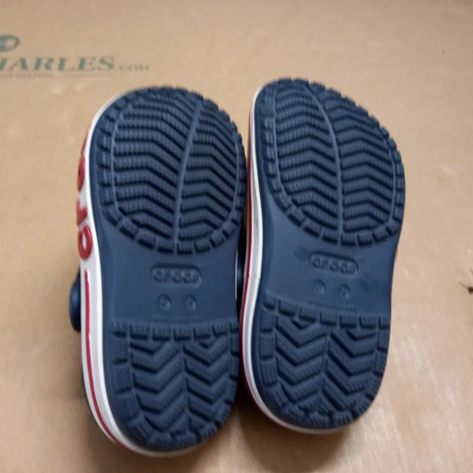 PAIR OF KIDS CROCS IN NAVY - C 8