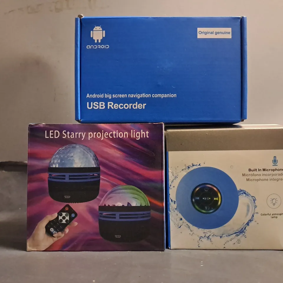 APPROXIMATELY 7 ASSORTED ITEMS TO INCLUDE -WATERPROOF SPEAKER , LED STARRY PROJECTION LIGHT , USB RECORDER 