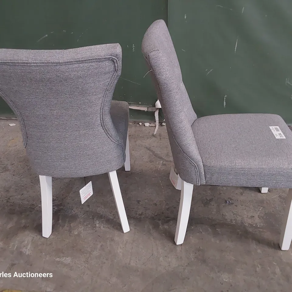 PAIR OF UPHOLSTERED BUTTONED BACK DINING CHAIRS GREY FABRIC ON WHITE PAINTED LEGS 