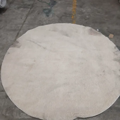 BEIGE CIRCULAR RUG