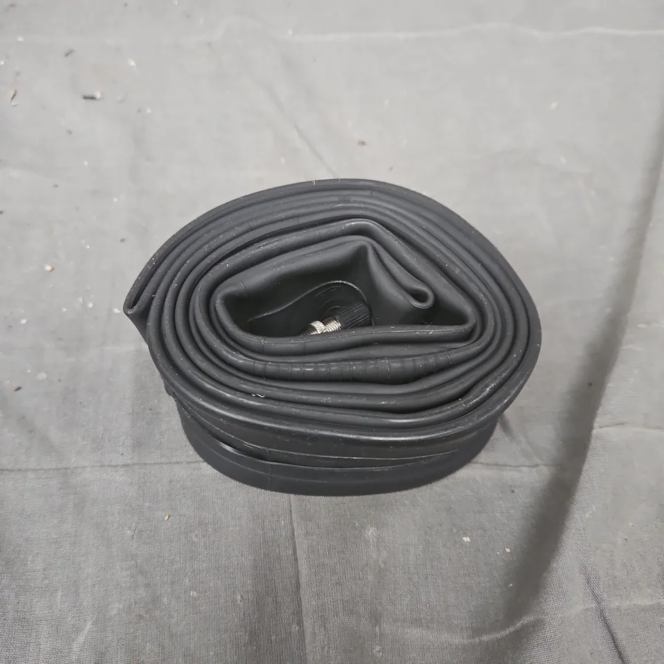 ROLLED BLACK RUBBER INNER TUBE WITH VALVE STEM (VEHICLE PART)