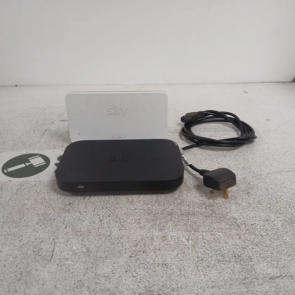 TOTE OF APPROXIMATELY 12 ASSORTED HOUSEHOLD ITEMS TO INCLUDE SKY ROUTERS, POWER SUPPLY ETC